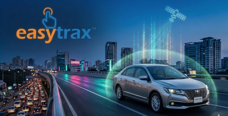 A silver sedan drives on an elevated highway at dusk in a modern city, with digital graphics of a satellite and data streams, and the easytrax logo in the background.